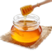 jarof honey with honey spoon