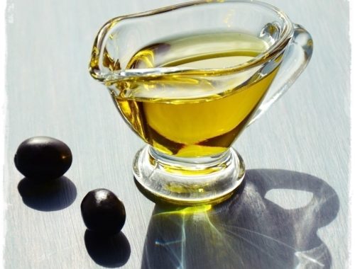 olive and jug of evoo