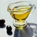 olive and jug of evoo
